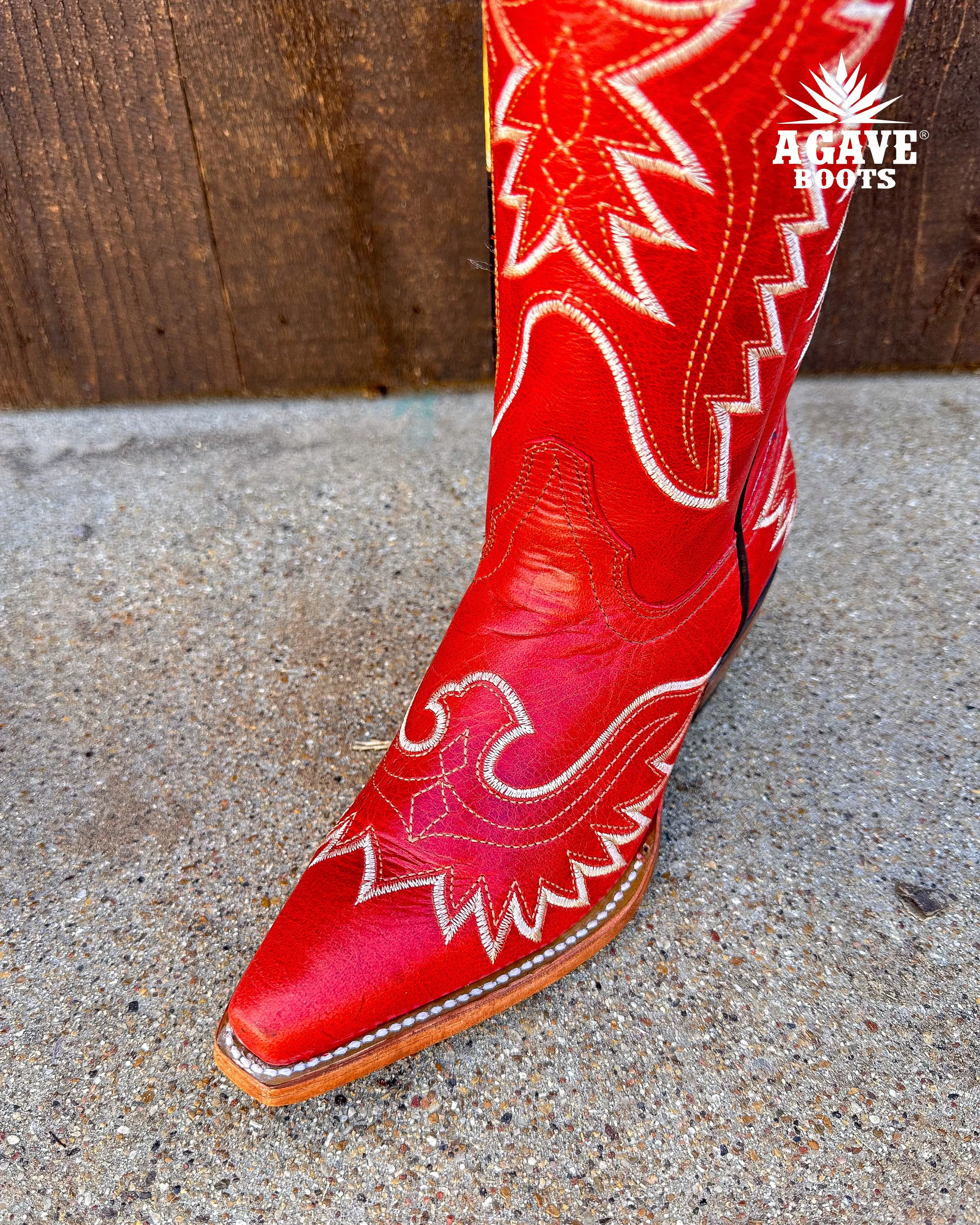 Sure! Heres an optimized title for your e-commerce product:

Stylish Womens Tall Red Cowboy Boots - Modern Western Design